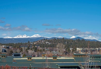 arial image of Bend, Oregon and mountain range by Robert Kropacek